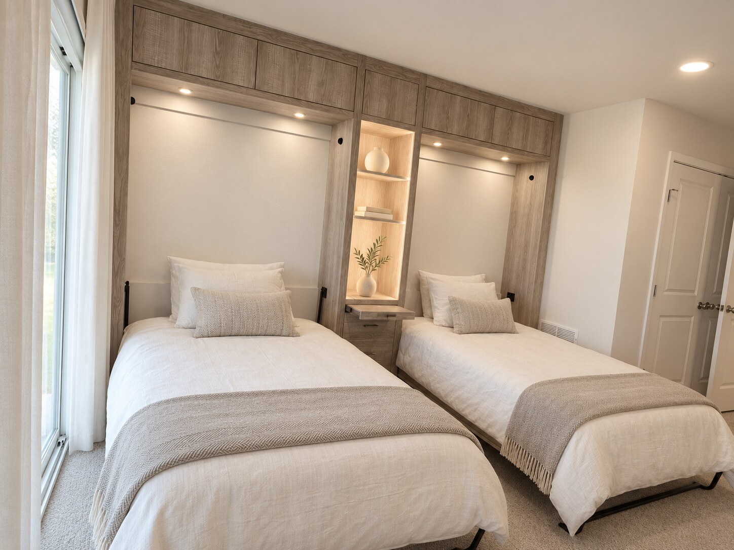 Two open twin Murphy beds in weathered wood cabinetry with illuminated center shelving